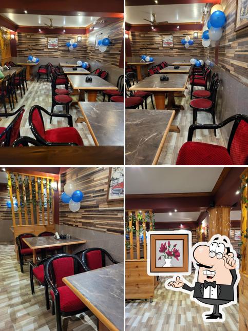 Take a seat at one of the tables at Step In Restaurant