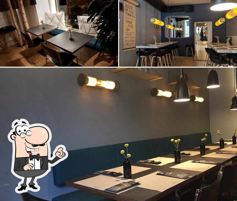 Dai un'occhiata agli interni di Wolf Burger & Steak Bar