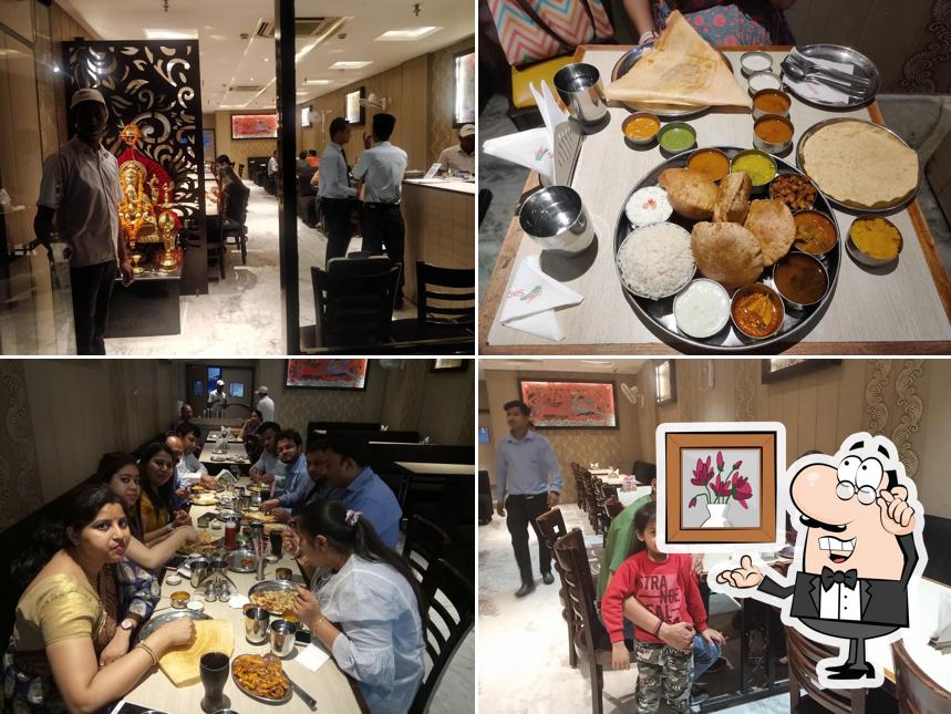 Take a seat at one of the tables at Sagar Ratna