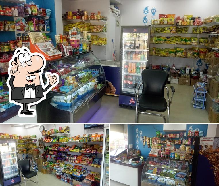 The picture of interior and food at Sarthi Parlour - Amul Parlour and Bakery