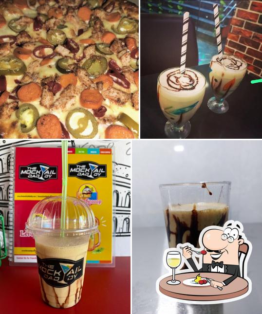 Among various things one can find food and drink at The Pizza Dine-Neral