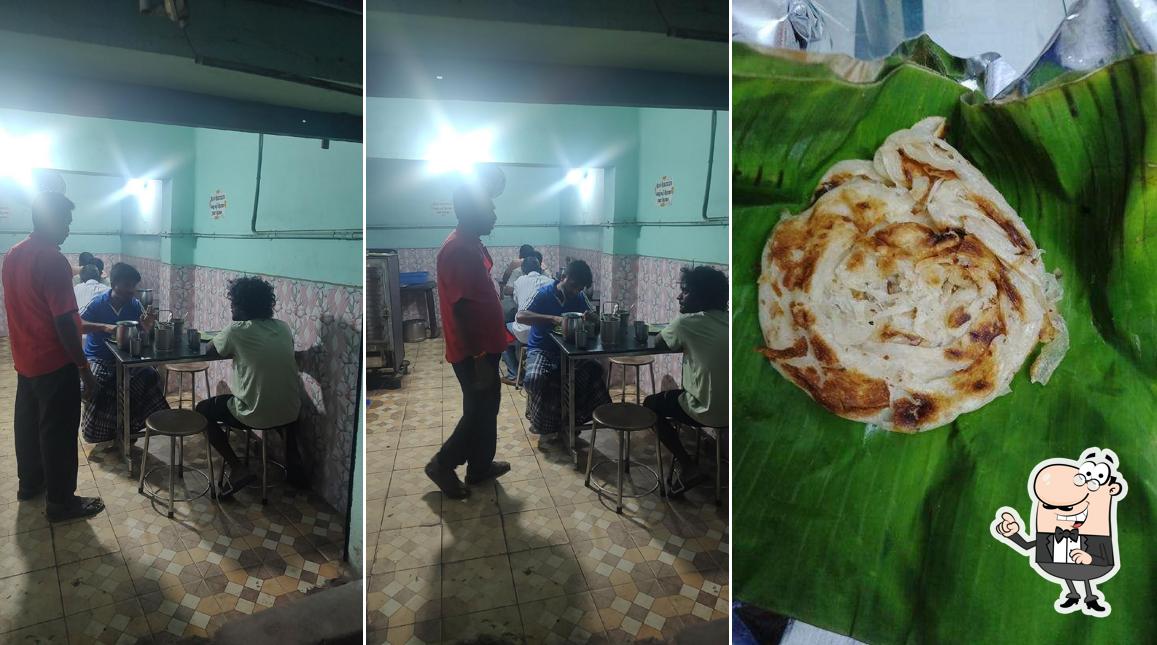 Take a seat at one of the tables at Anandhi Idly Shop