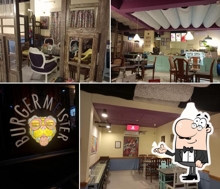 Take a seat at one of the tables at Burgermeister - HSR