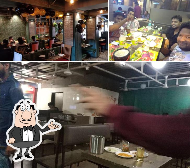 Check out the photo depicting interior and dining table at FOODKING FAMILY DINE-IN BAR & RESTAURANT