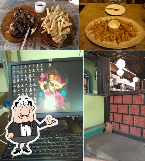 Check out the picture showing interior and food at Green Valley Restaurant