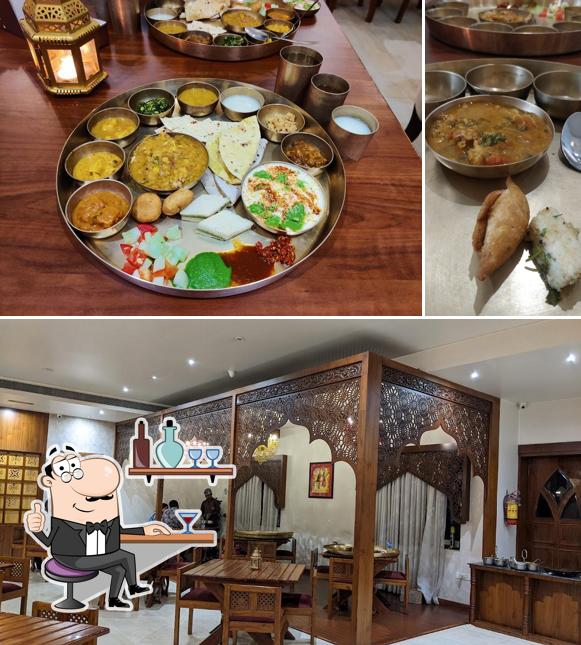 Take a seat at one of the tables at Rajwada