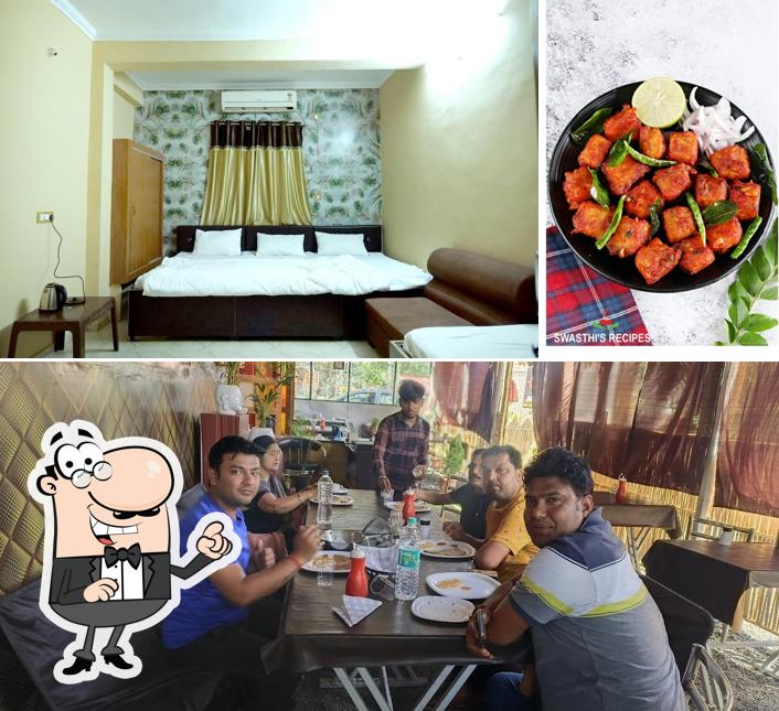 Take a look at the photo depicting interior and food at Shivay Restaurant jhalrapatan - Best Restaurant in Jhalarapatan, Family Restaurant, Veg Restaurant in Jhalrapatan