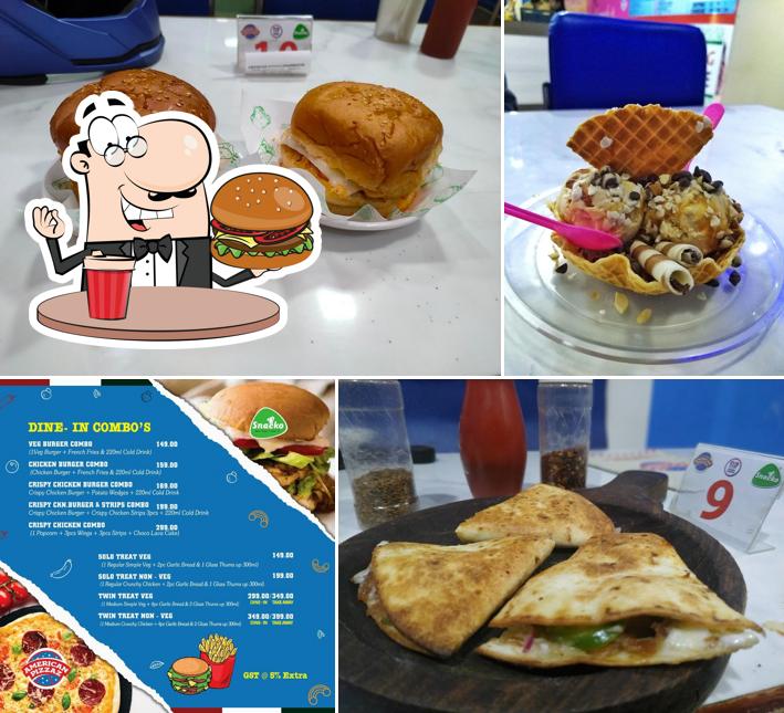 Order a burger at American Pizzaz & Fried Chicken