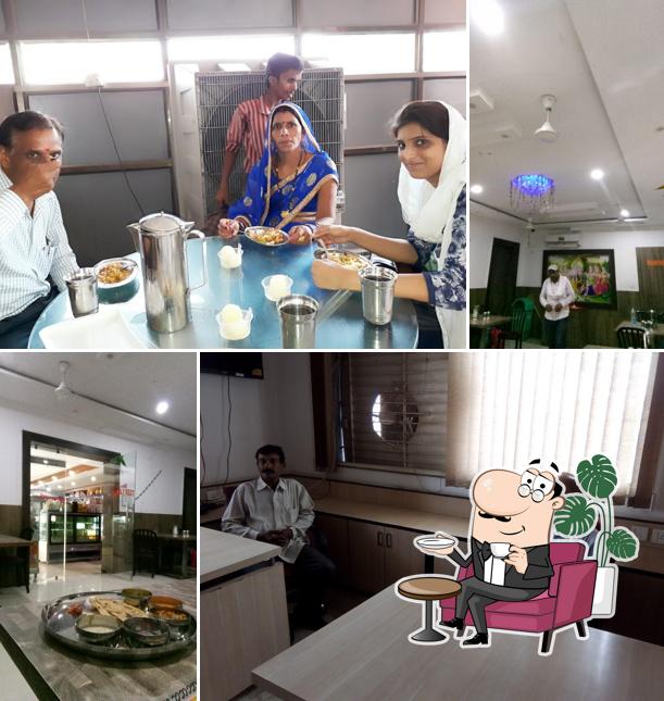 The interior of Kamdhenu Dairy and Sweets Best Sweet Shop In Rewa/Restaurant In Rewa/Dairy Product In Rewa