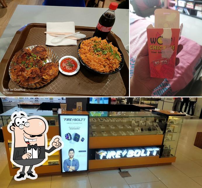 This is the picture displaying interior and food at Wow Chicken