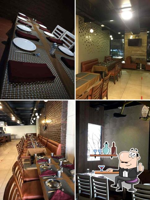 Take a seat at one of the tables at 27 Yard Restaurant