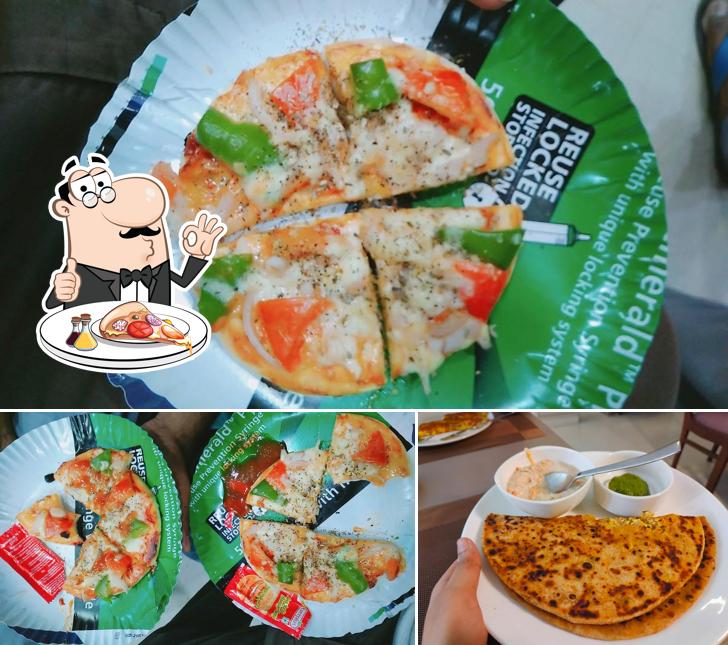 Try out pizza at Bindaas Rooftop Restaurant (Hotel R.K.Heights)