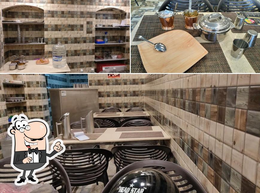 Take a seat at one of the tables at Namma Bhai Veetu Biryani