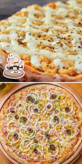 Comida em Edys pizzaria comedoria