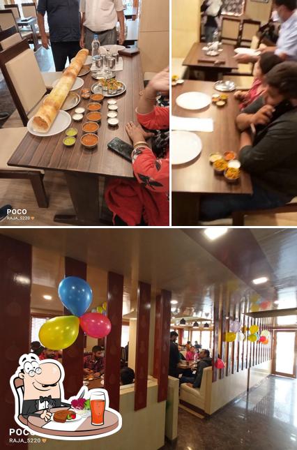 The picture of Sagar Ratna Pahalgam’s dining table and interior