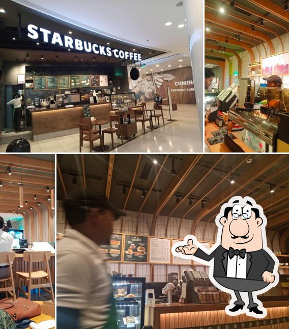 Take a seat at one of the tables at Starbucks