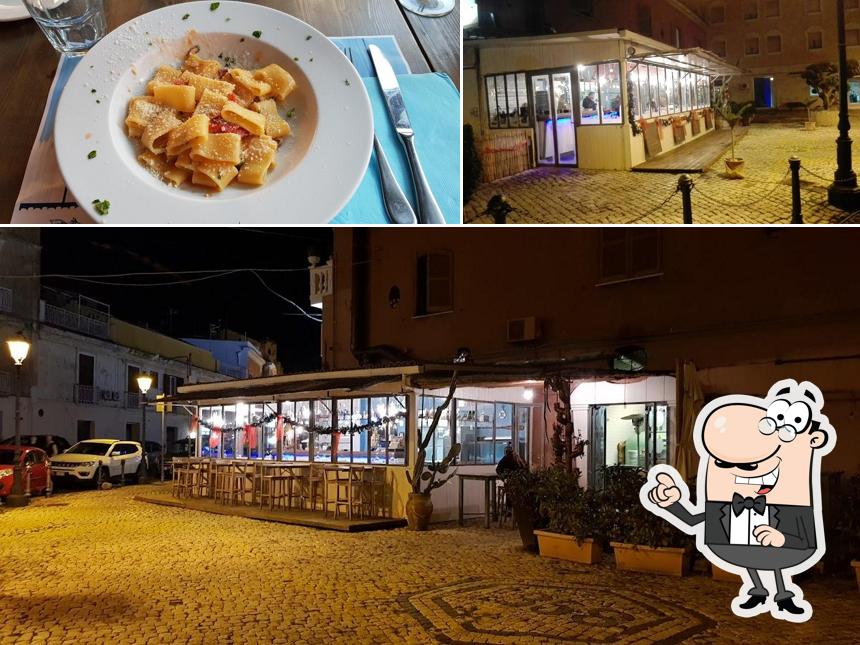 Questa è la foto che raffigura la esterno e cibo di O' Nacchenell