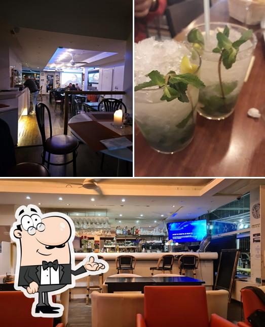 Questa è la immagine che mostra la interni e alcol di Bar Restaurant Pizzeria Lounge Luna