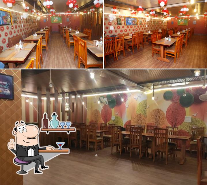 Take a seat at one of the tables at Taste of Tongue Family Restaurant