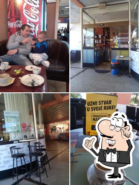 Siediti a un tavolo di Caffe Bar TI-MI