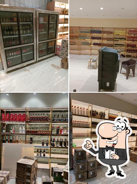 Take a look at the photo displaying interior and exterior at Wine Shop Kanwarpura