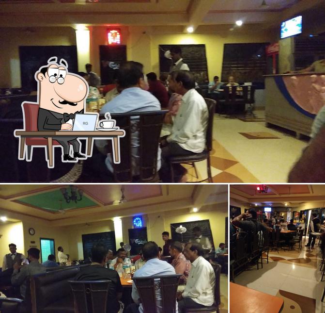The interior of Adarsh Bar And Restaurant