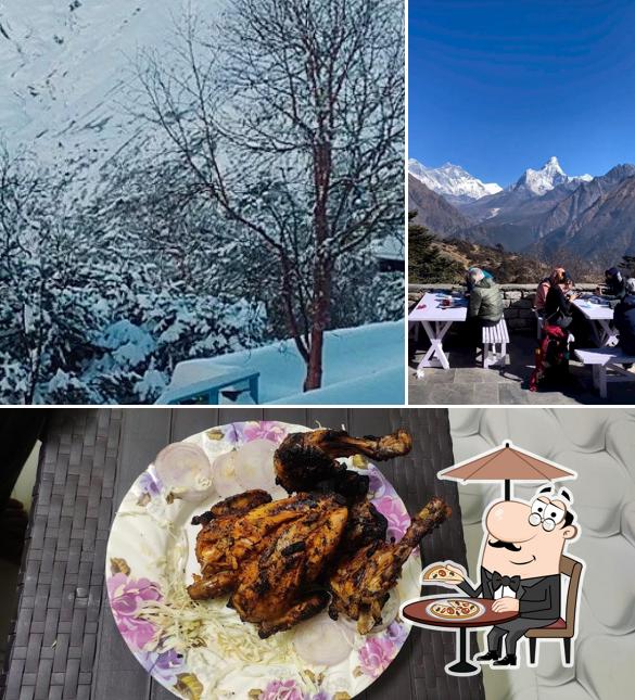 Check out the photo showing exterior and food at HOTEL EVEREST