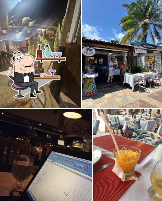 Sente em uma das mesas no Papa Gente