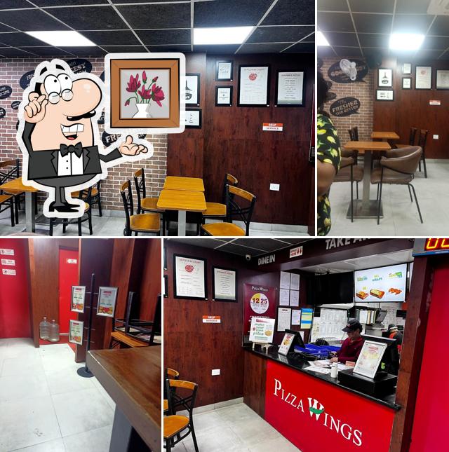 Check out how Pizza Wings Dwarka Mor looks inside