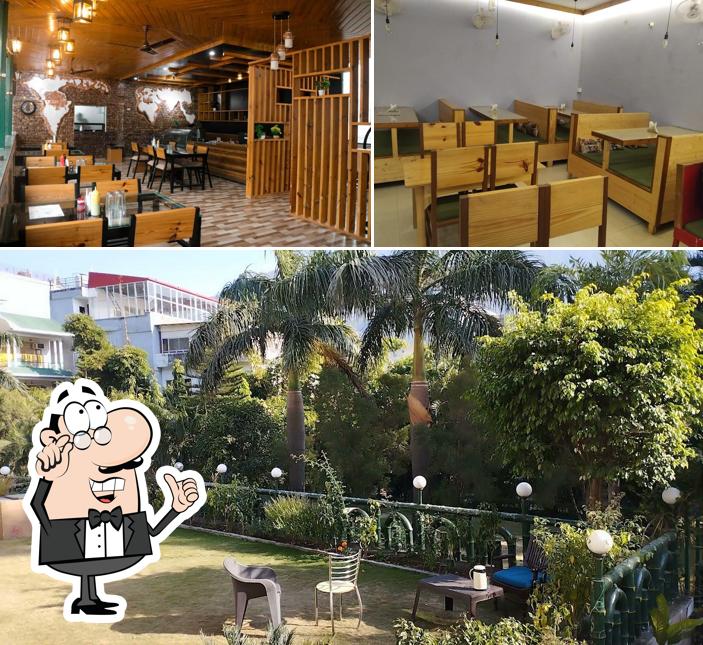 This is the photo depicting interior and exterior at Vatika Cafe Restaurant in Tapovan