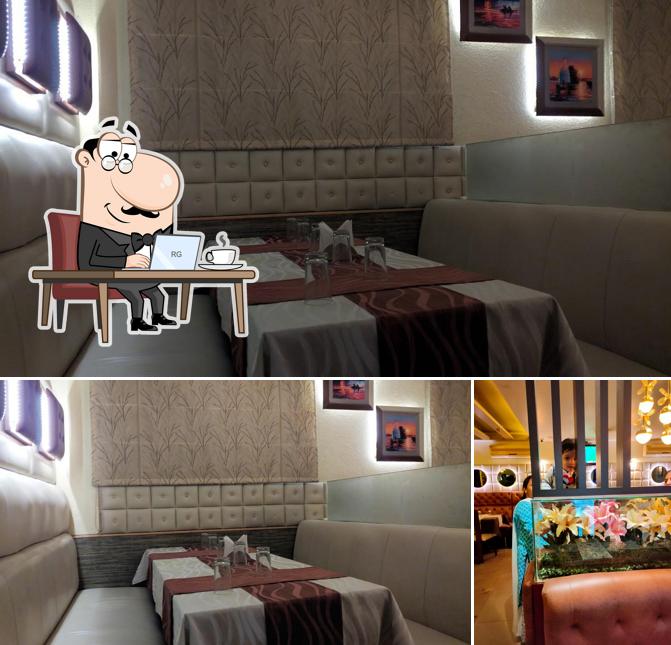 Take a seat at one of the tables at Shelly Restaurant