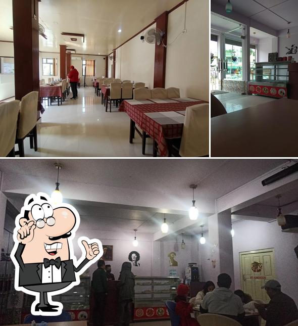 Take a seat at one of the tables at Cafe Central