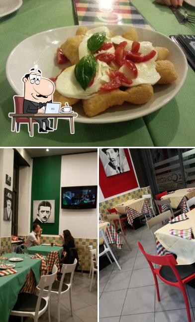 Ristorante Pizzeria Le Comiche si caratterizza per la interni e tavolo da pranzo