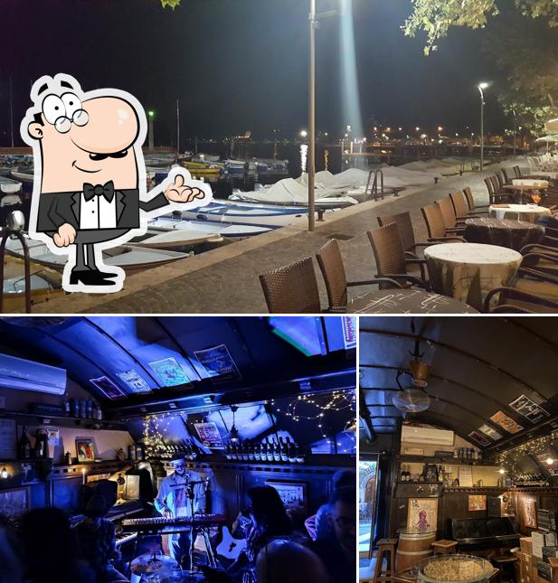 Dai un'occhiata agli interni di Osteria Can e Gato