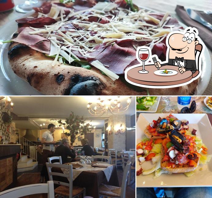 Tra le diverse cose da Ristorante Pizzeria Amabile Napoli si possono trovare la cibo e interni