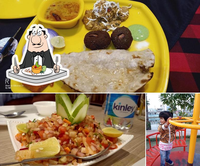 Among various things one can find food and play area at Sanju Ka Dhaba & Restaurant