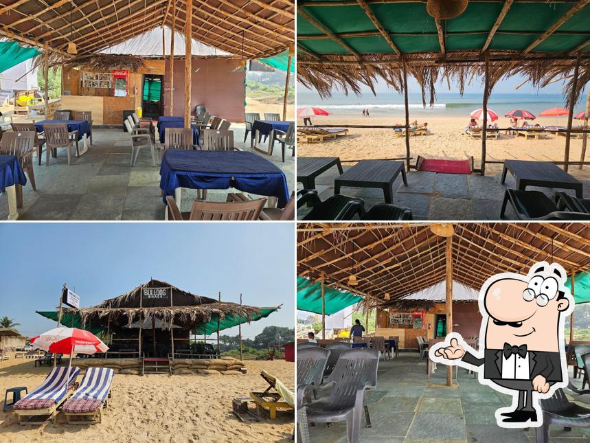 Take a seat at one of the tables at Bulldog Beach Shack