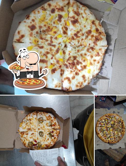 Get pizza at Yummy Pizza Khair