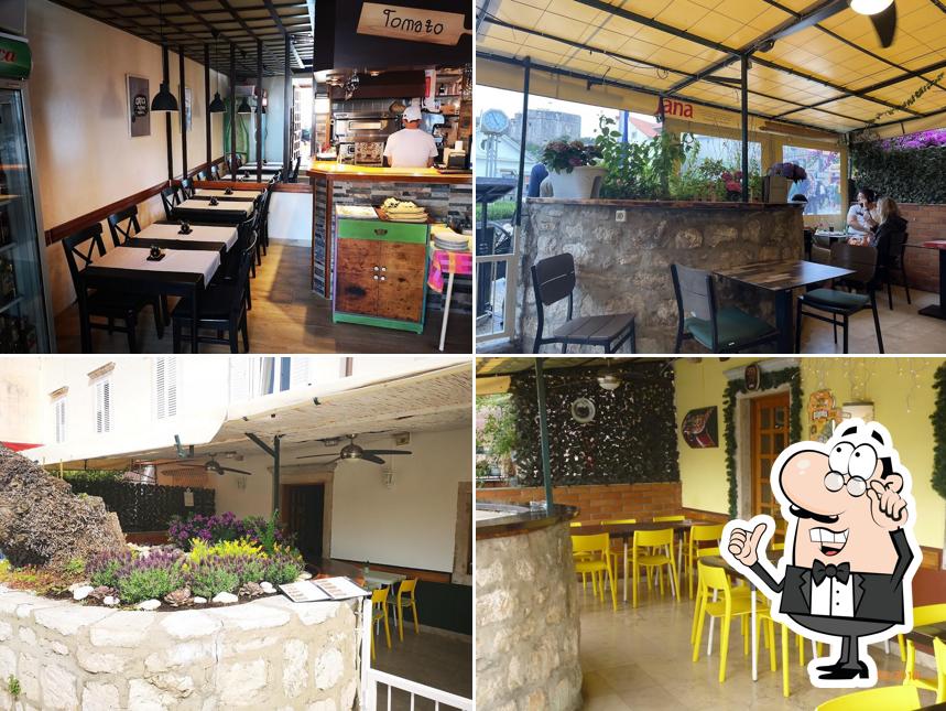 Dai un'occhiata agli interni di Pizzeria Tomato