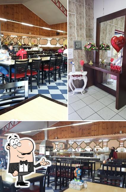 O interior do Gil Restaurante E Pizzaria