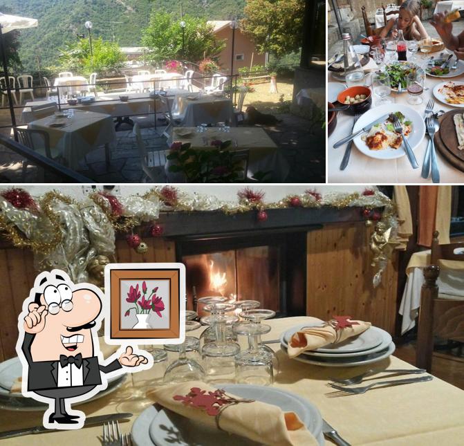 La immagine della interni e tavolo da pranzo di Trattoria Nestin