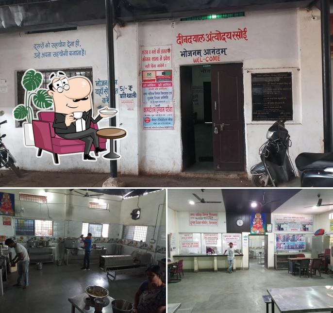 Check out the picture depicting interior and exterior at Dindayal Rasoi kendra 1