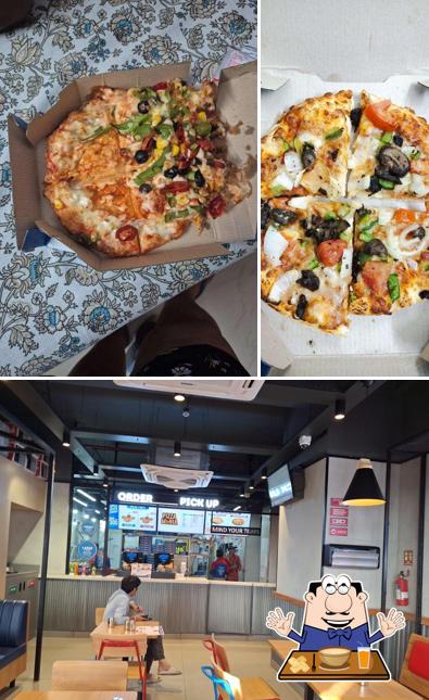 Among various things one can find food and interior at Domino's Pizza Malla Talai, Udaipur