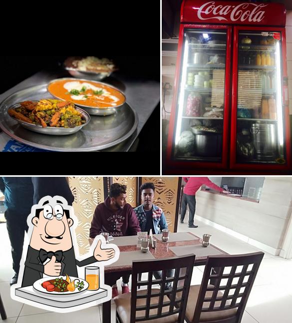 The picture of Meshi Vegetarian Dhaba Corner Wala’s food and dining table