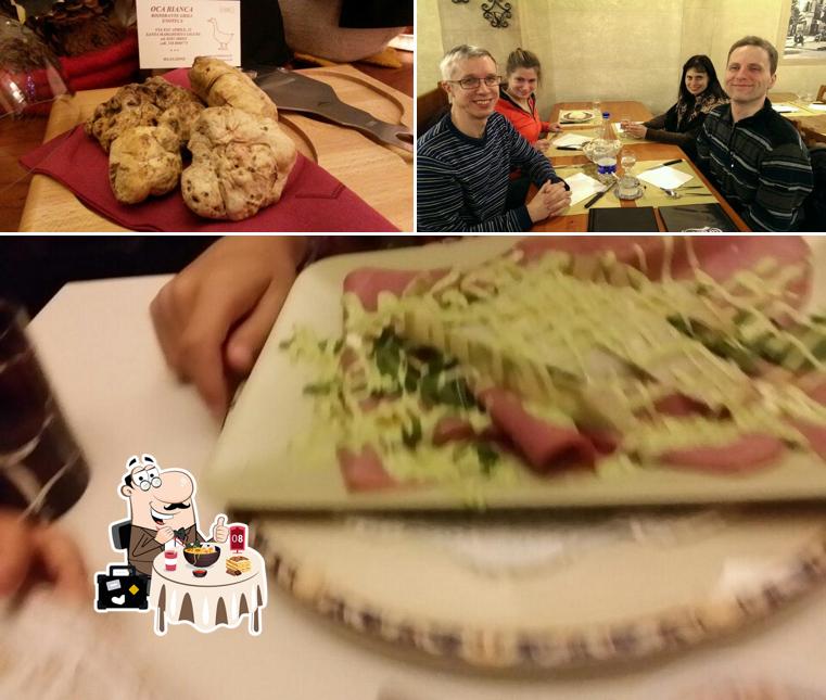 Questa è la immagine che presenta la cibo e interni di Oca Bianca