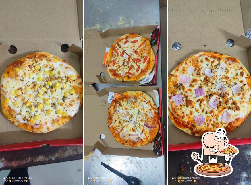 Get pizza at AR Cafe