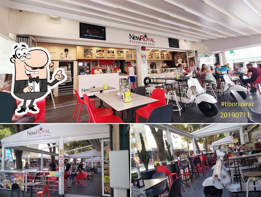 Siediti a un tavolo di New Royal Pizza take away