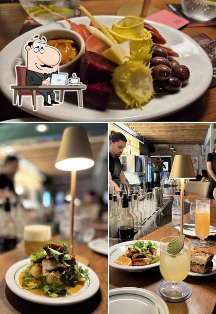 Dê uma olhada a foto apresentando interior e comida no Bar dos Cravos