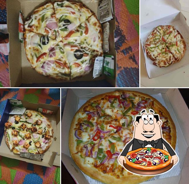 Pick pizza at The Foodies Nest Cafe