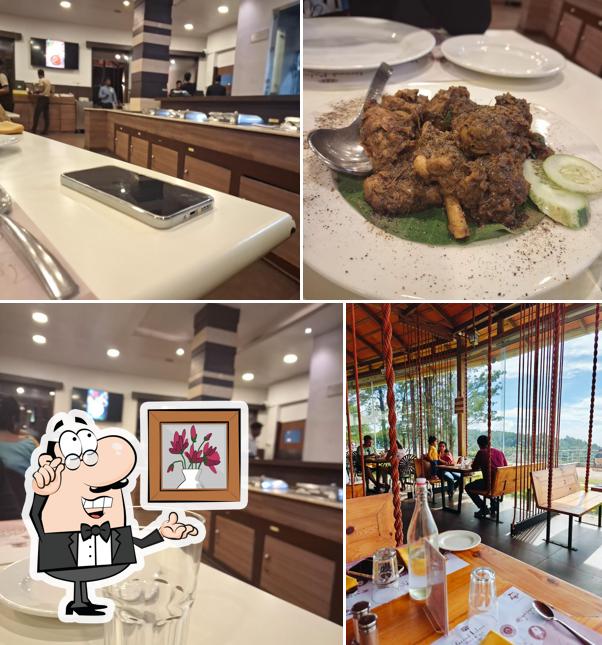 Take a seat at one of the tables at The Orange Multi Cuisine Restaurant, Yercaud